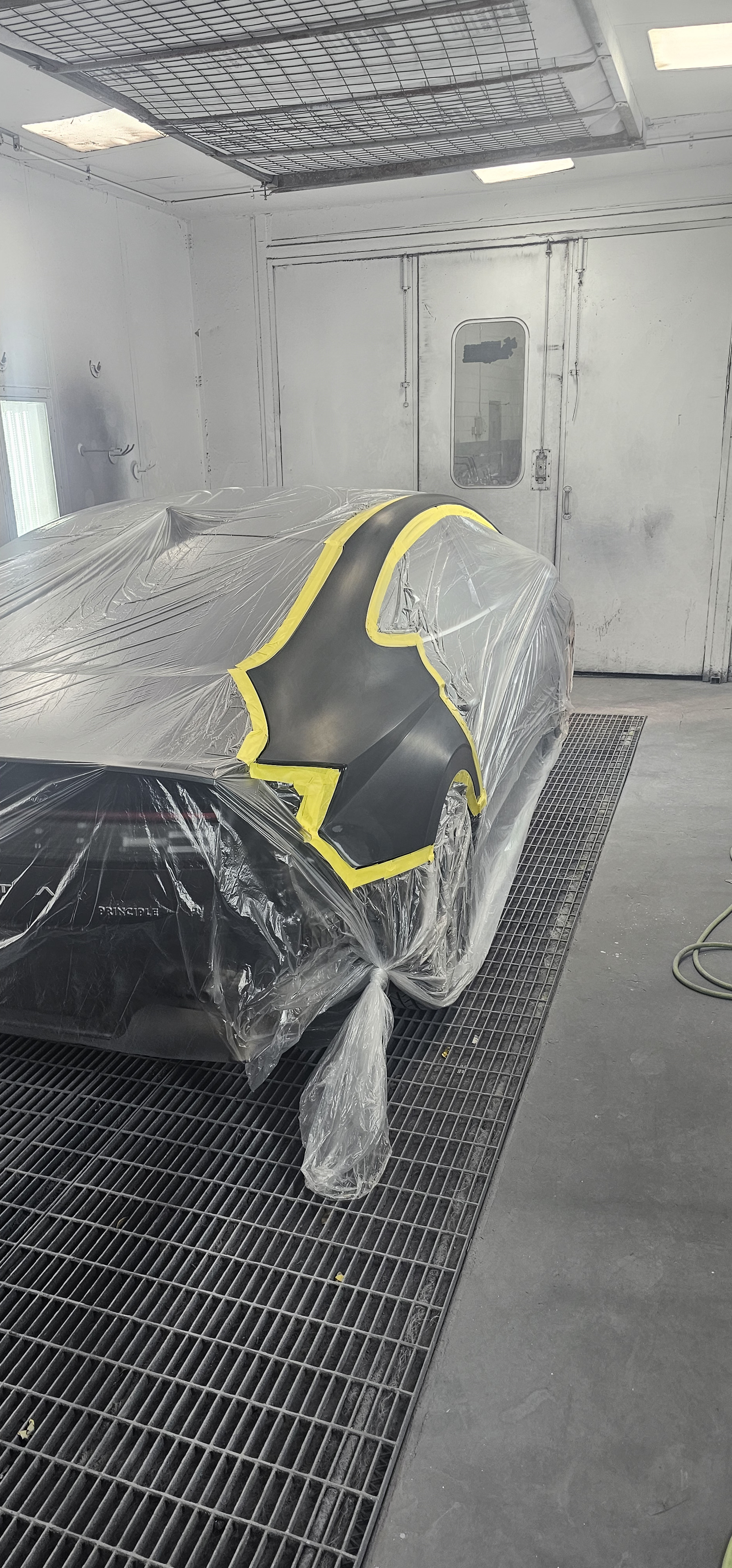 Mission Body Shop interior with vehicle in repair bay
