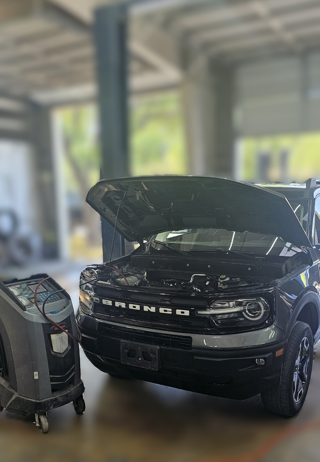 Ford Bronco serviced inside the Mission Body Shop bay